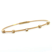 14K Yellow Gold Flexible Diamond Station Bangle Bracelet