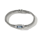 Load image into Gallery viewer, Sterling Silver Woven Bracelet With London Blue Topaz
