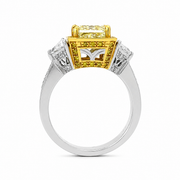 Platinum and 18K Yellow Gold 3-Stone Yellow Diamond Halo Ring