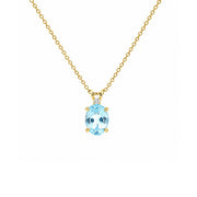 14K Yellow Gold Oval Blue Topaz and Diamond Pendant