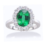 Load image into Gallery viewer, Emerald And Diamond Halo Ring