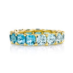 Load image into Gallery viewer, Blue Topaz Graduated Eternity Band
