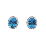 Load image into Gallery viewer, 14K White Gold Swiss Blue Topaz and Diamond Halo Earrings